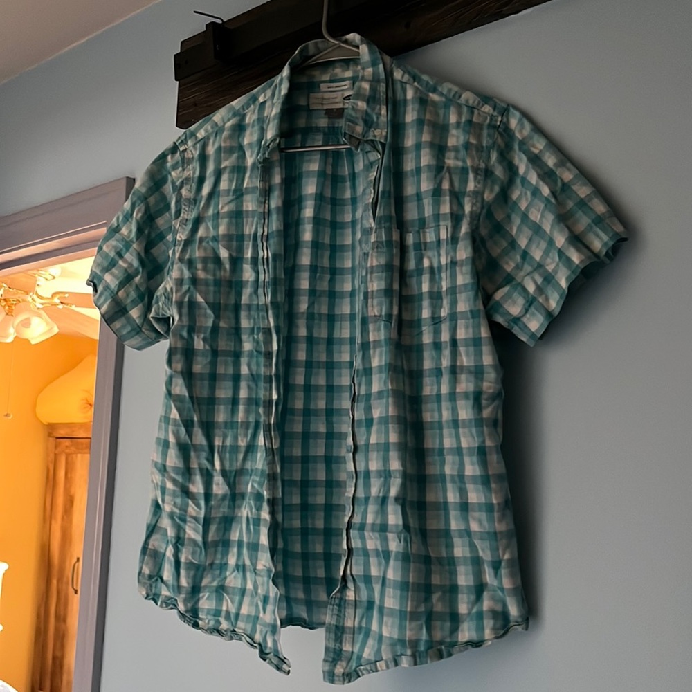 blue and white shirt sleeved button up